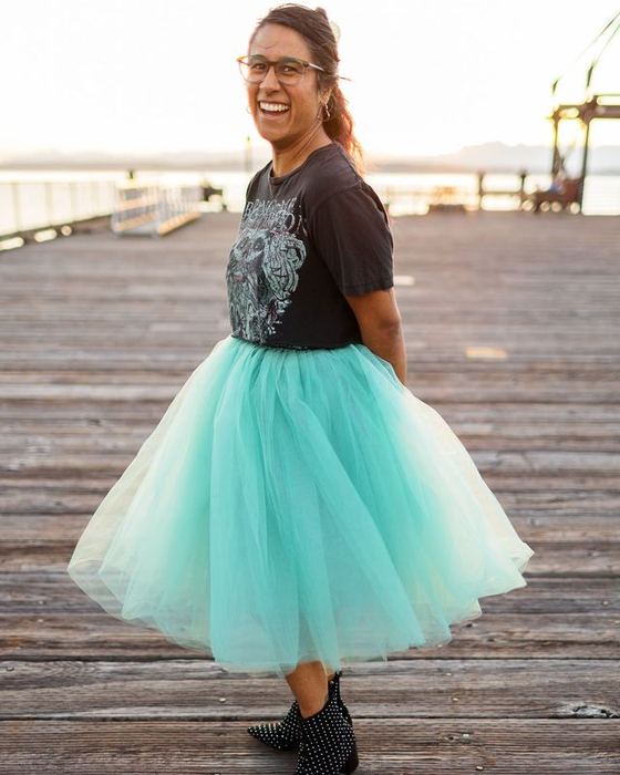 A mint tulle skirt and a band tee on the dock